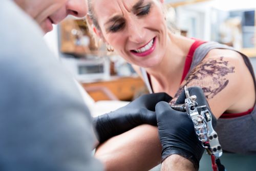 tattoo-pain-arm-area